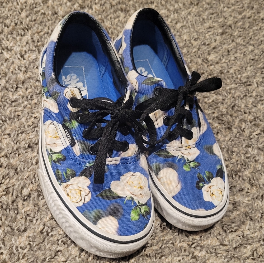 Blue vans with white roses